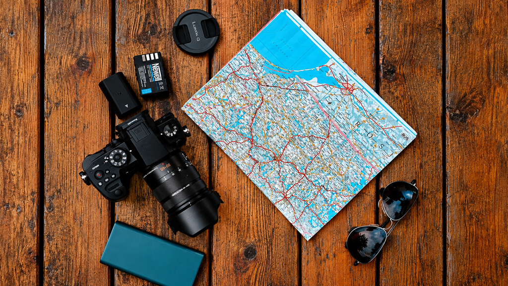Travel map and backpack for planning a budget trip