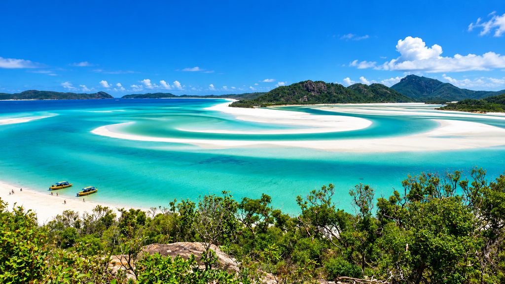 Whitehaven Beach in Australia with white sand and turquoise water