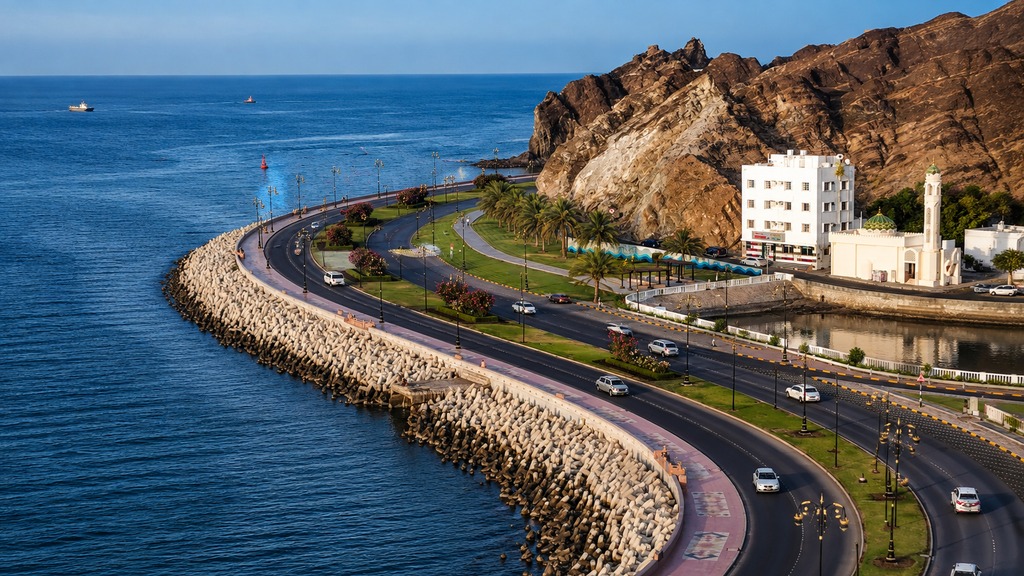 Muscat Corniche with mountains and traditional buildings in Oman