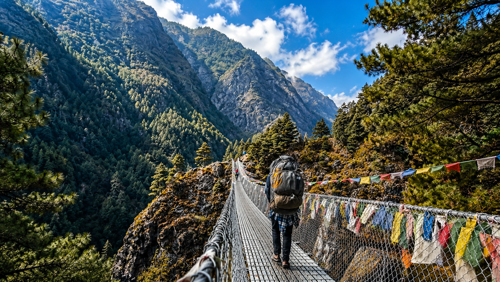 Backpacker hiking in the mountains of Nepal