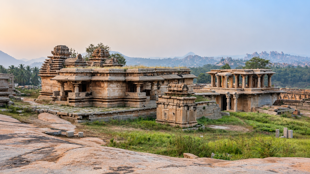 Ancient temple structures and giant granite boulders in Hampi, Karnataka.