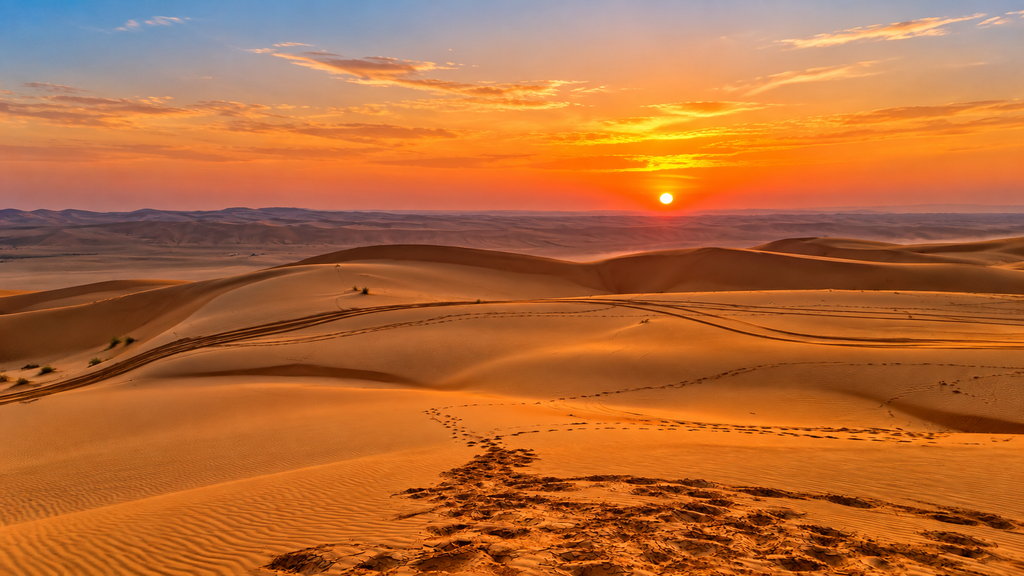 Golden dunes at sunset in Sharqiya Sands Oman