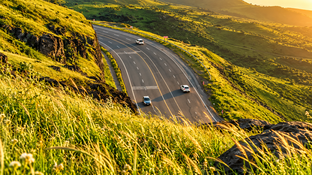 Green Dhofar mountain road during Khareef season Oman