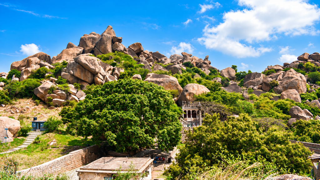 Historic stone walls and rocky hills at Chitradurga Fort in Karnataka. Bangalore to Hampi road trip